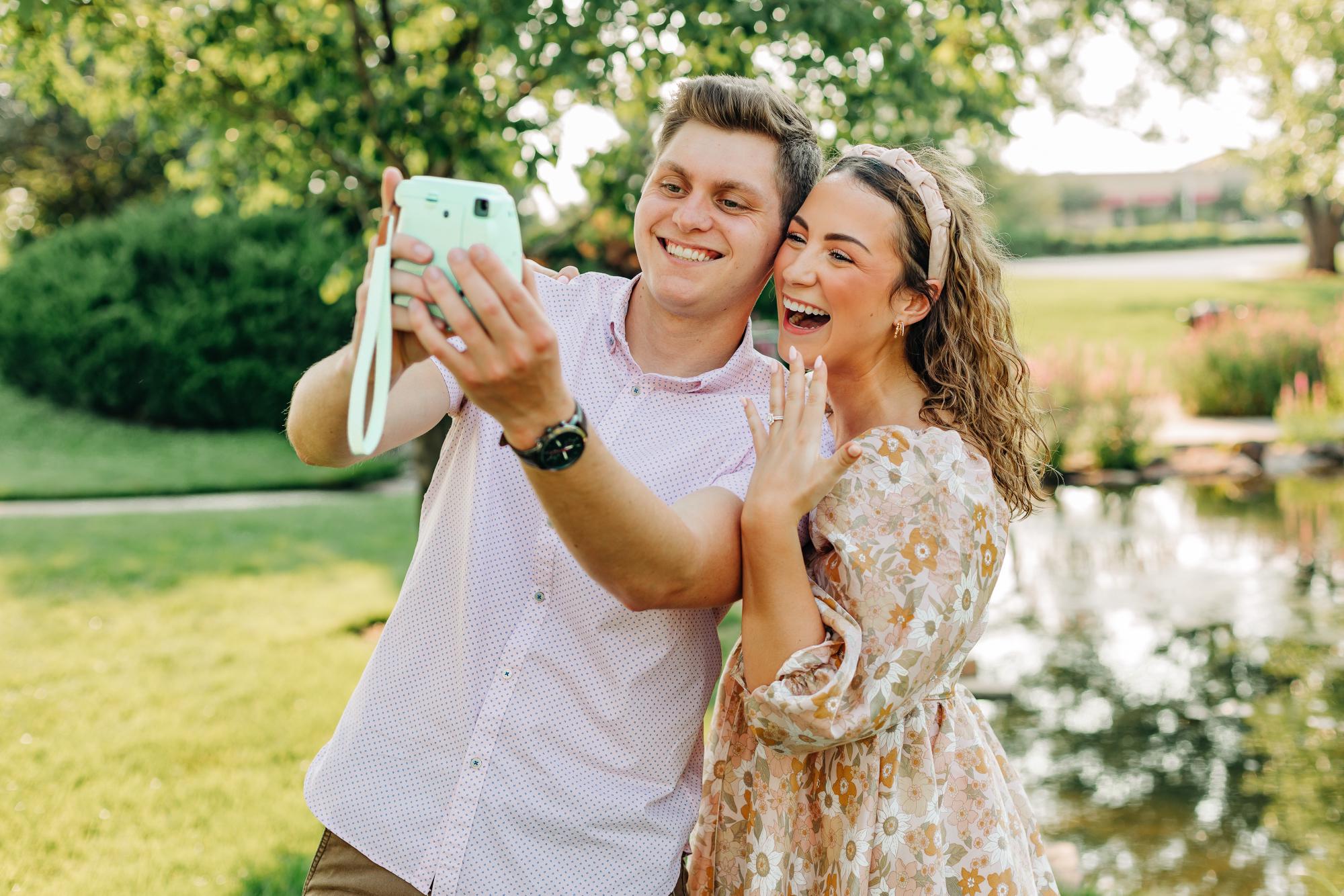 Continuing one of their favorite traditions of taking a monthly polaroid together