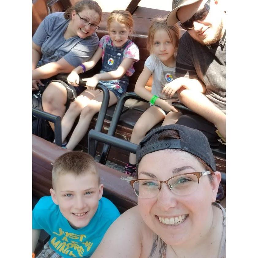 Carolyn, Chris, and I taking the kids to Kings Island and riding The Viking Ship.