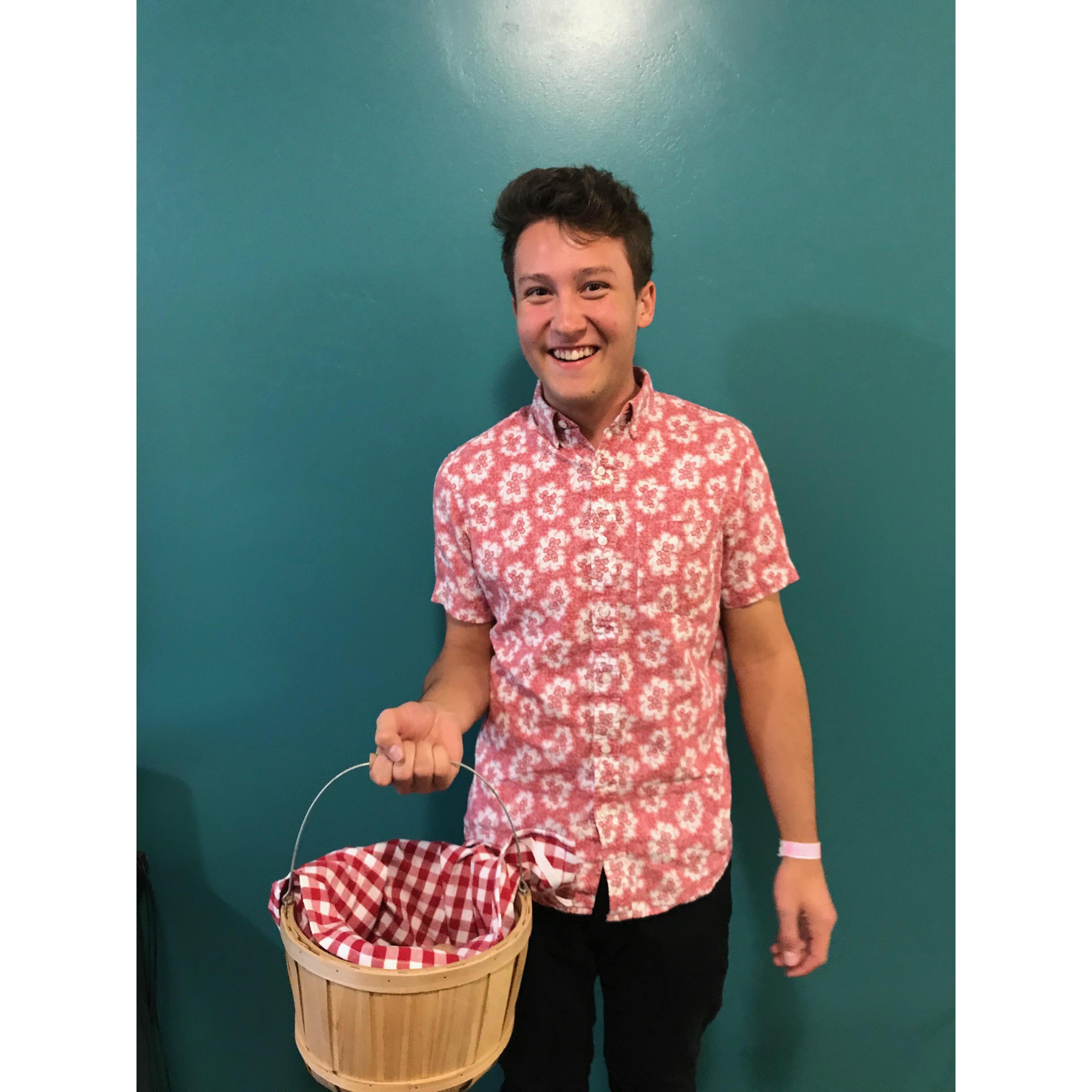 Sam holding the basket he bought for us to pick apples from the BYUI Apple Orchard on our first date!