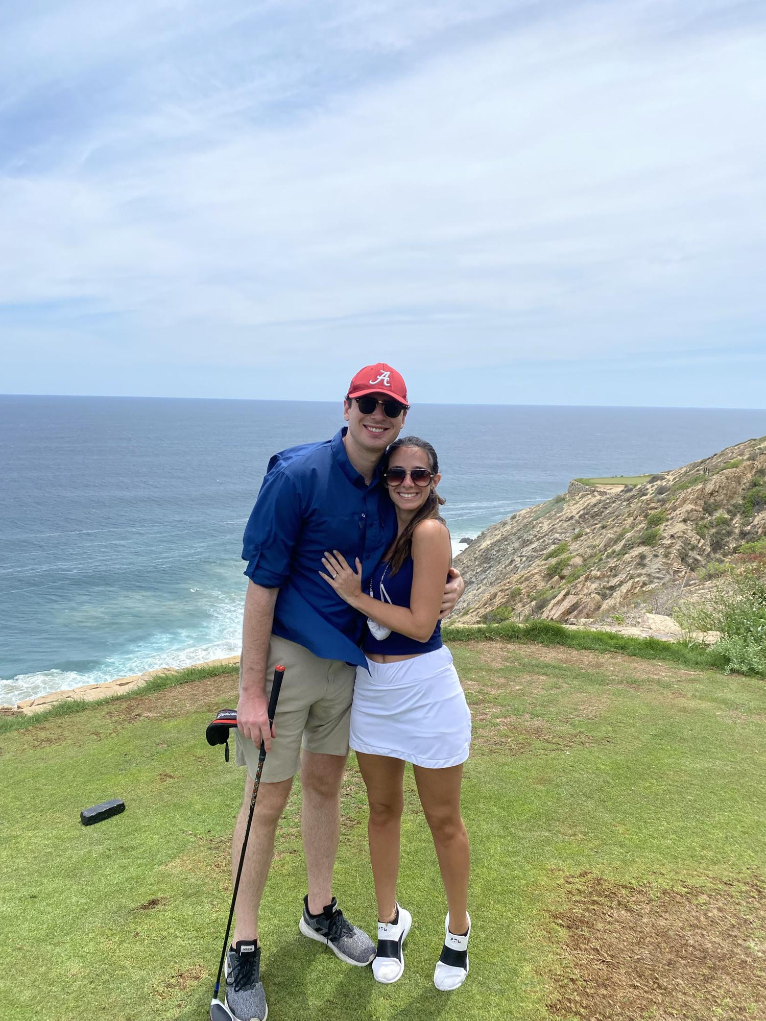 Evan teaching me to love golf in Cabo!
