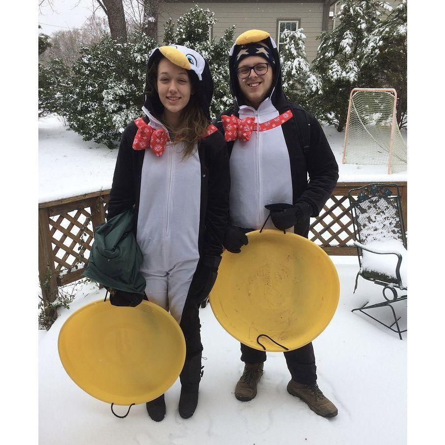 We found these matching onesies at a Macy's and couldn't resist going sledding in them!