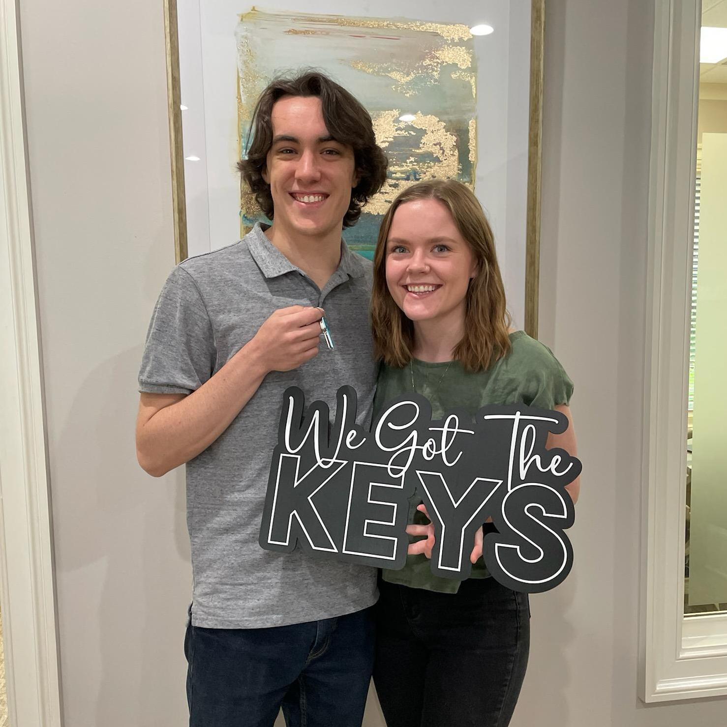 Getting the keys to our first home together.