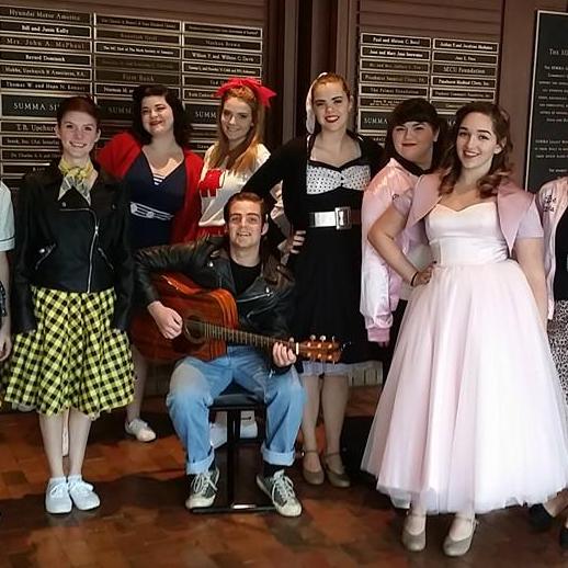 We Auditioned for "Grease: The Musical" as Danny and Sandy. Neither of us got our part, but it was a great time to get to know each other, surrounded by our friends.