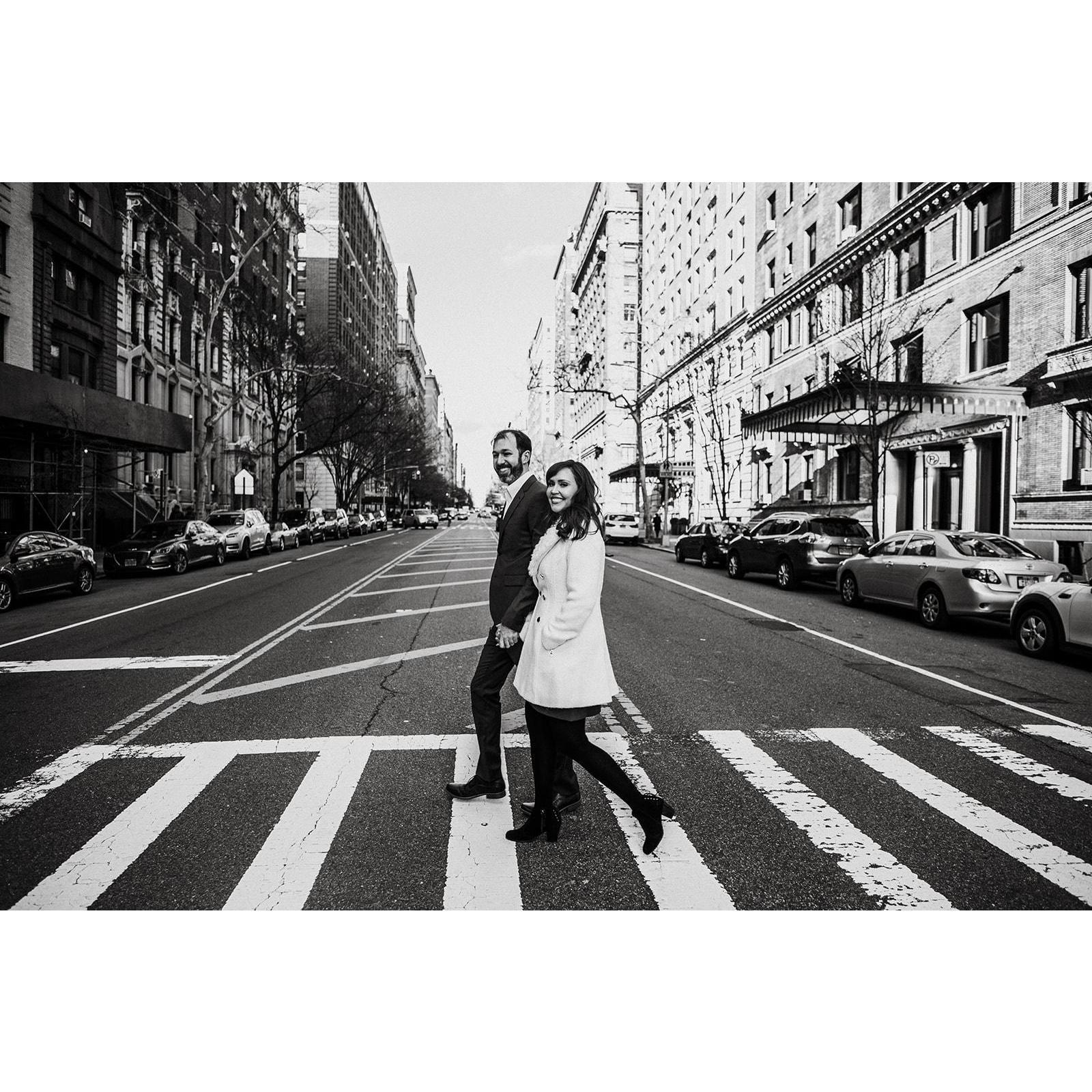 Engagement photo walking the streets of the Upper West Side