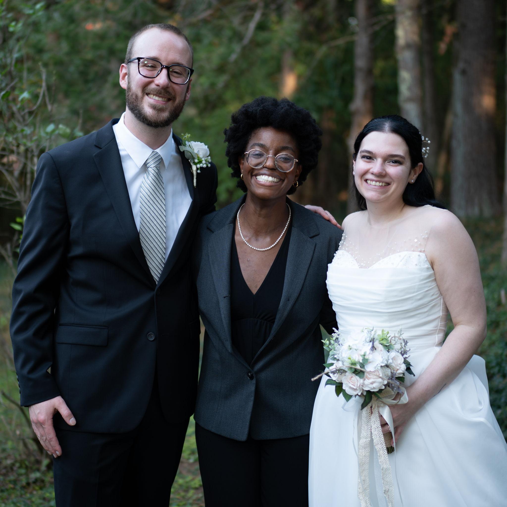The couple with Mira, who was kind enough to be the officiant