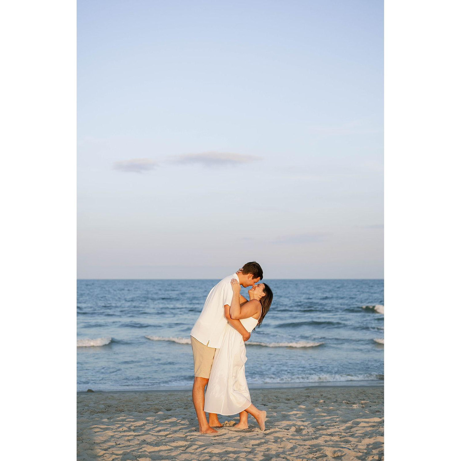 Karly & Sean on the beach to commemorate their engagement (July 2025)