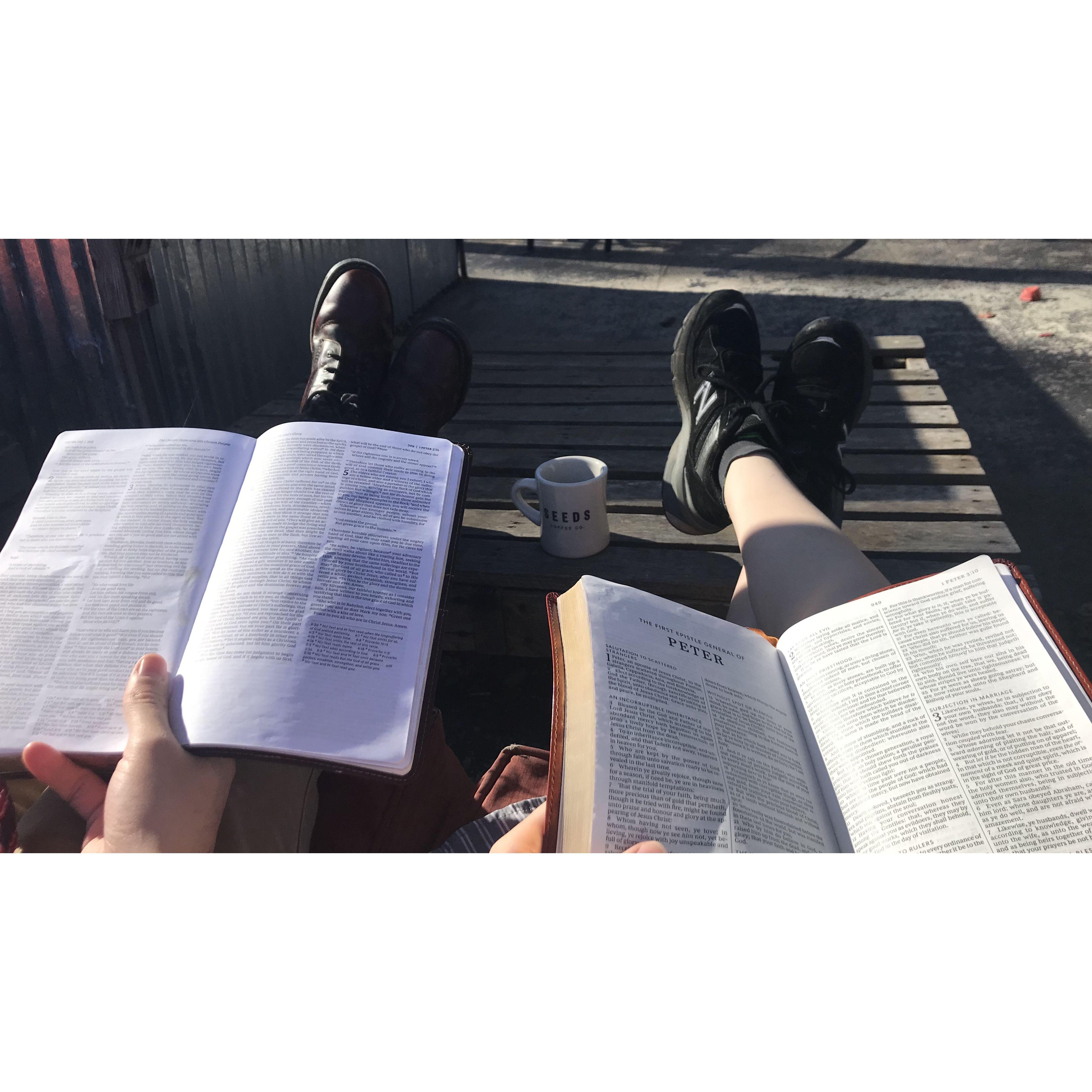 Reading Bibles together outside Seeds Coffee Co. in Homewood.