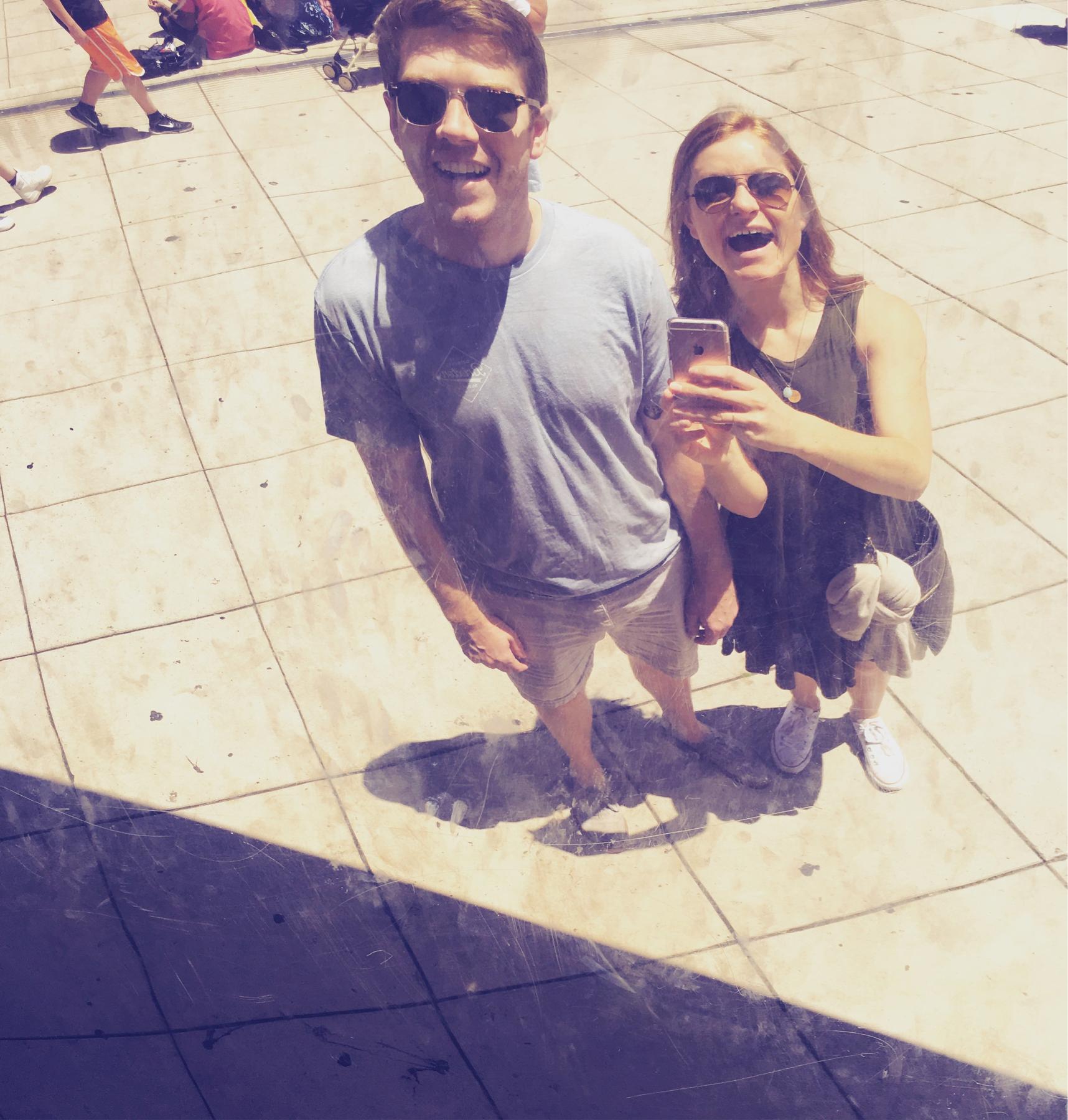 Reflection in the Chicago bean. Once upon a time, we traveled for vacations.