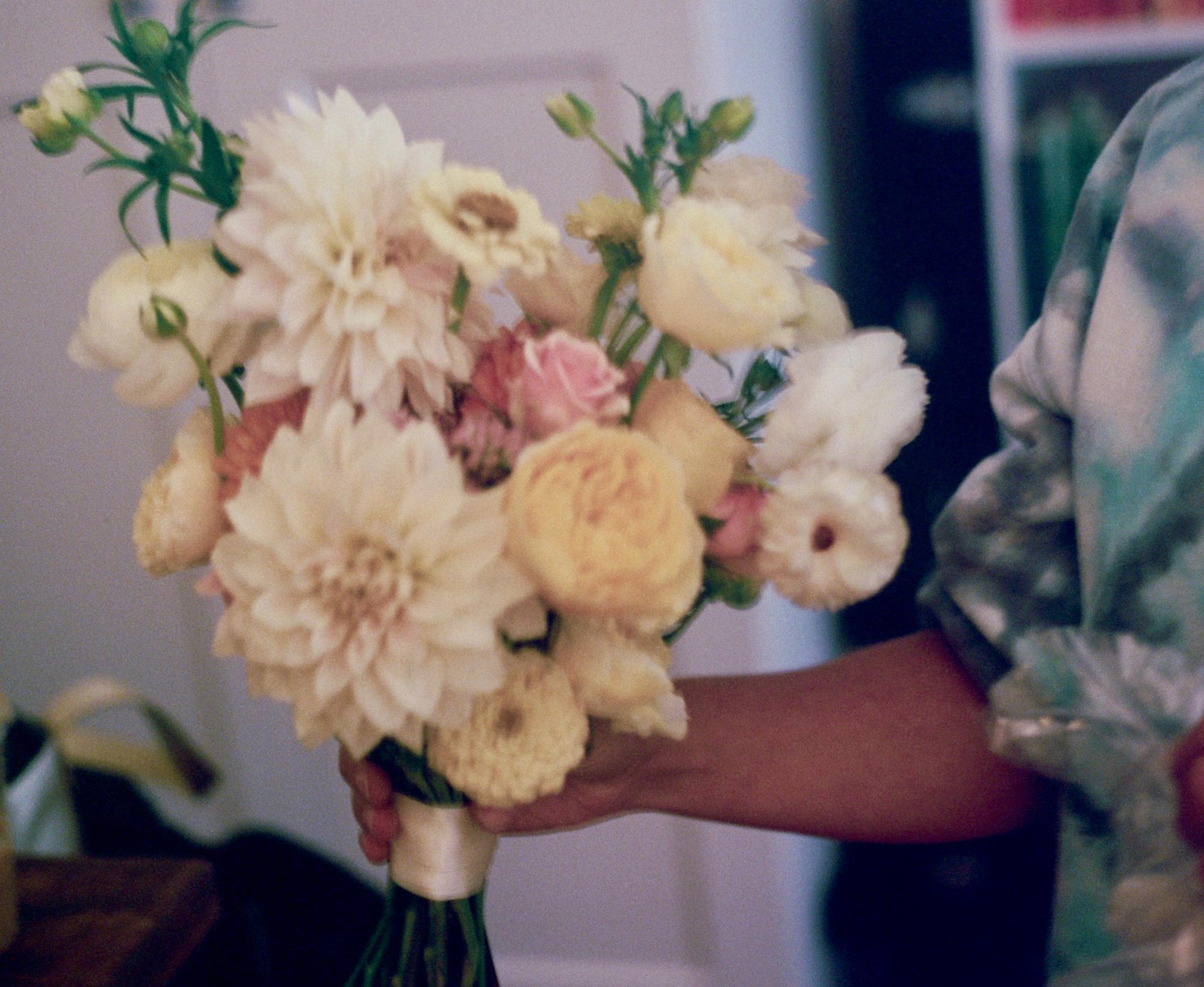 Bouquet Pic by Jacqueline Baker @shotsbyjacque. Bouquet by Nicole Cannon @budsofbrooklyn