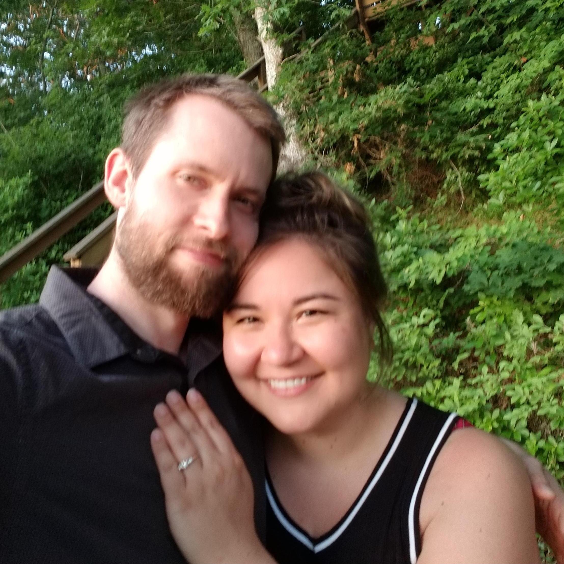 It's a little blurry, but this was taken just after Budd proposed and Mari said "yes". It was also taken just before 9 adults and 3 children sunk the dock into the lake. Still sorry for that one Mike.