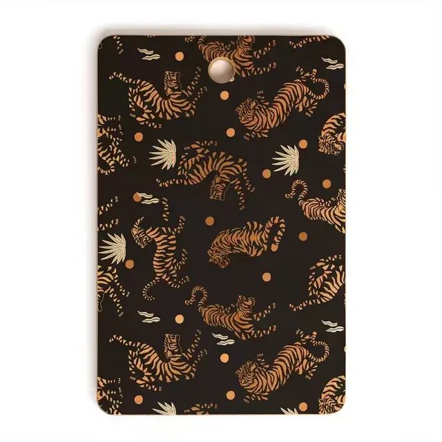 Marta Barragan Camarasa Golden tigers Cutting Board - Deny Designs