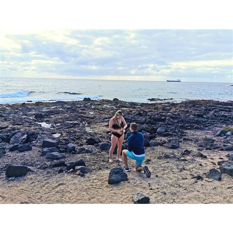 Elle admiring her new shinyyyy engagement ring