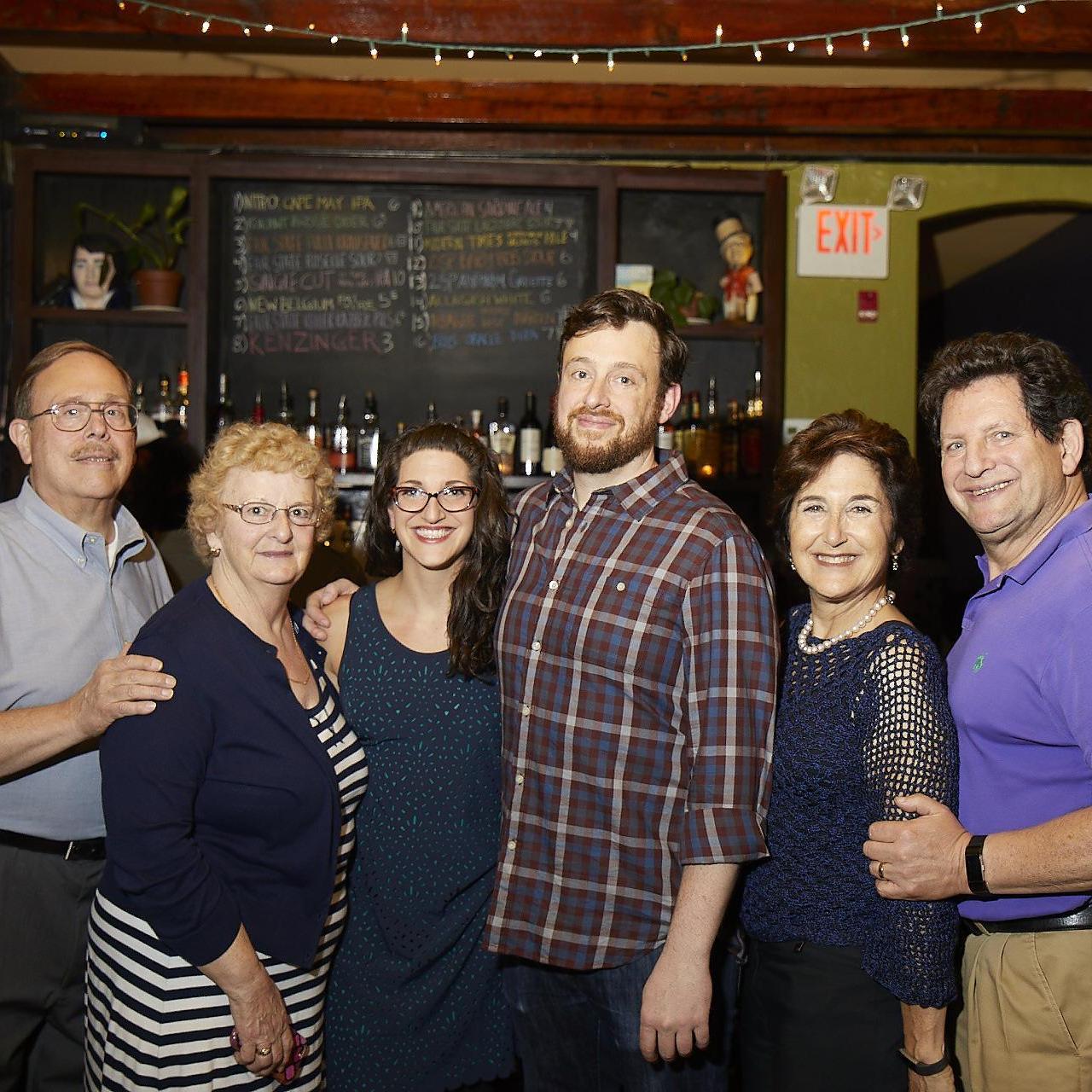 Our parents and us at the Suprise Engagement Party