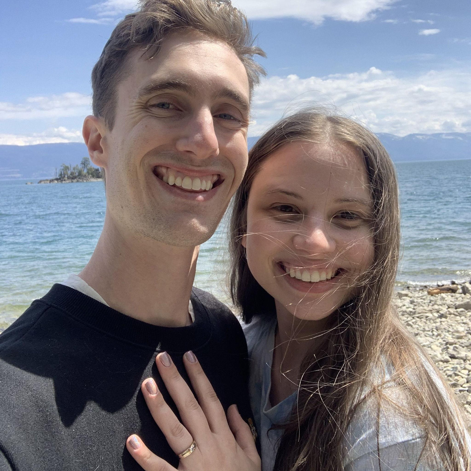 The day he proposed! He chose the perfect spot on the shore of Flathead Lake in Montana.