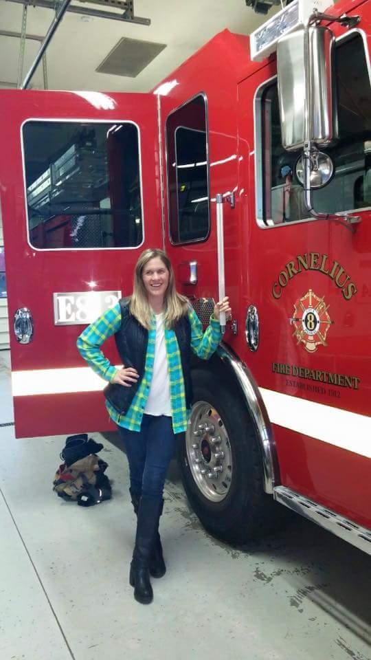Jenny and her big red rig.