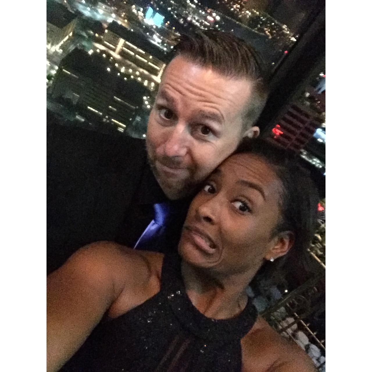 Dallas skyline and silly faces....totally us