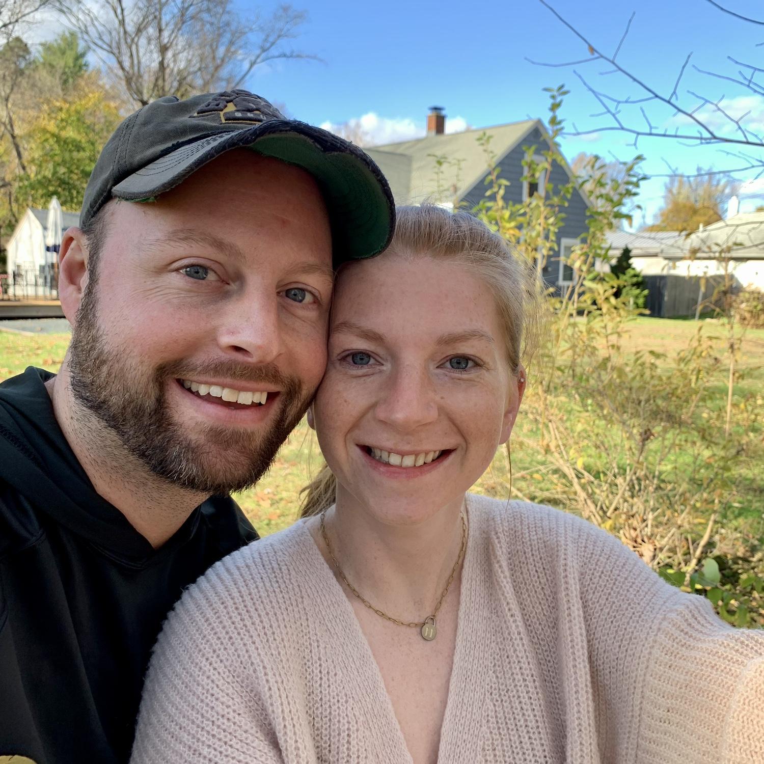 Our first photo together - carving our names into a tree at, now, our house!