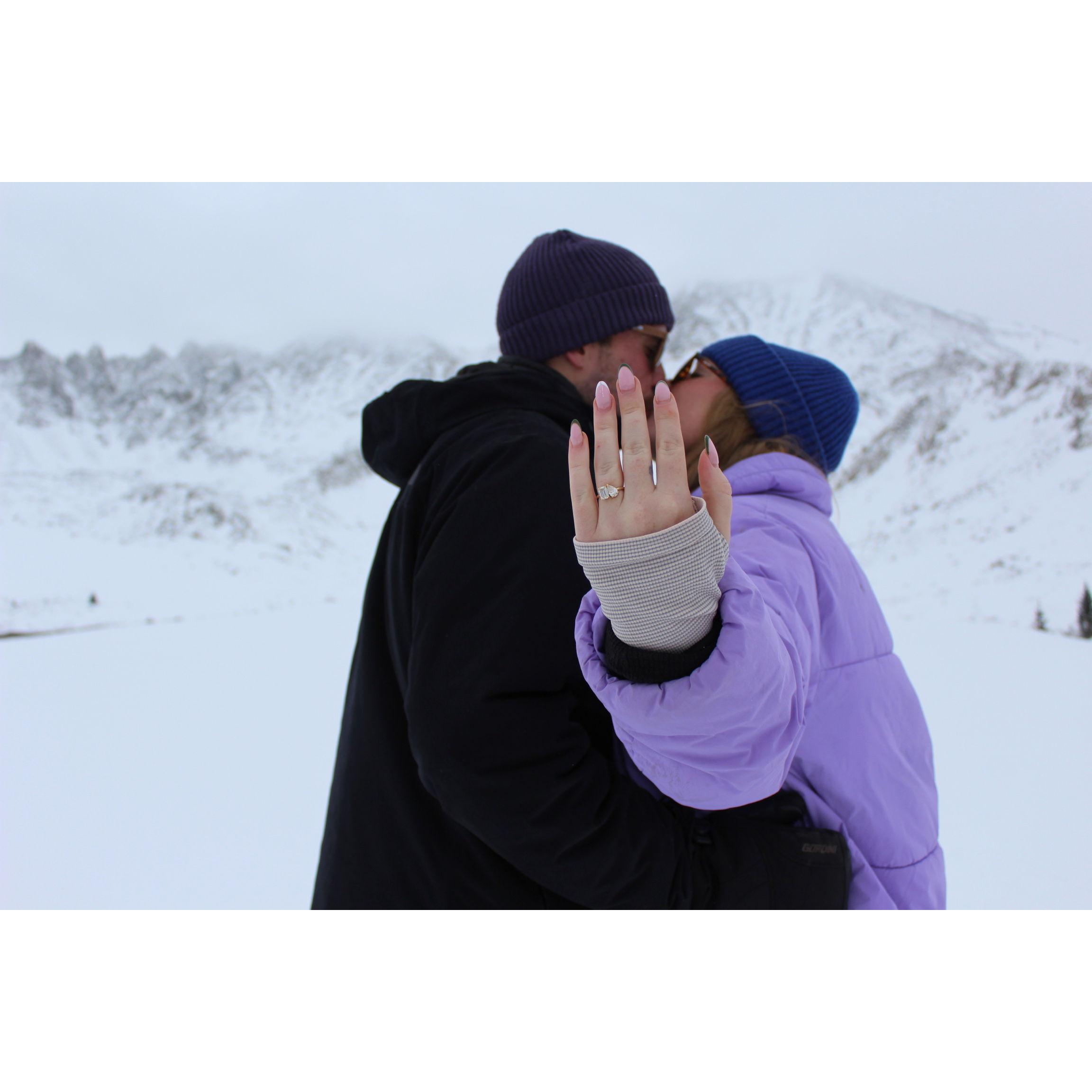 An engagement photo from a snowy hike near Leadville, CO.