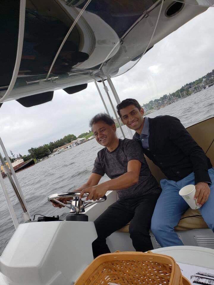 (Summer 2018) Avi teaching Kinjal's dad how to drive a boat!