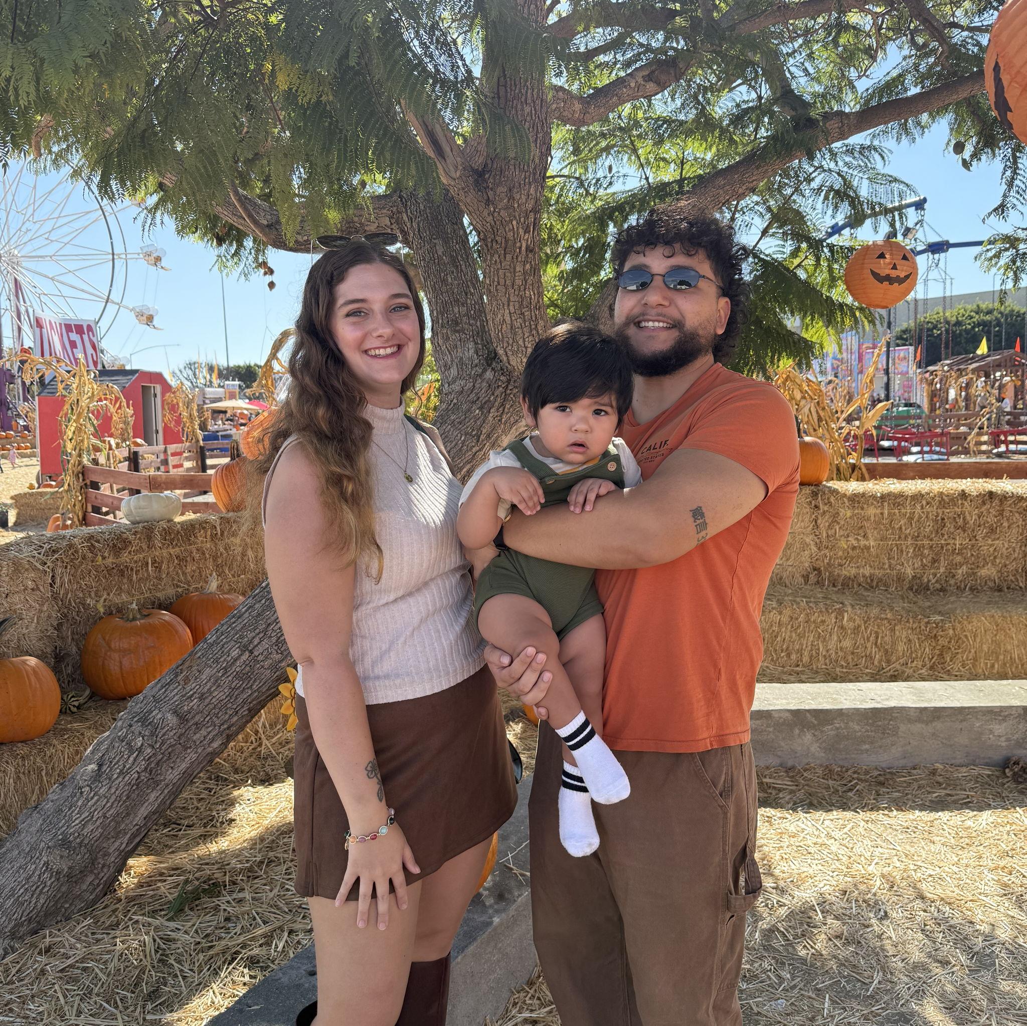 Justin and Ashley with Justin's Nephew Lucca, October 2025
