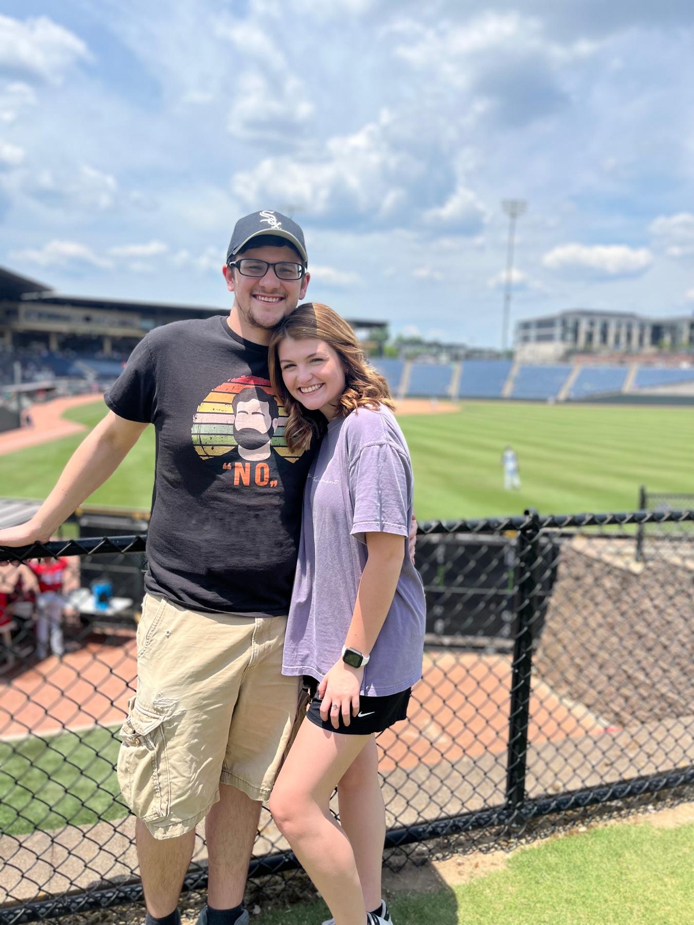 poor guy just wanted to watch the ball game and I drug him around to take pictures of the ball game