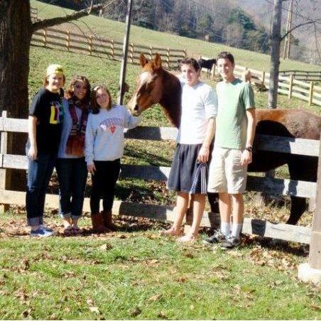 Fall of Freshman Year at UTK - Work Crew Weekend at Windy Gap, Young Life Camp in ASHEVILLE, NC. We were not on each other's radar at this point. This was our first photo together.