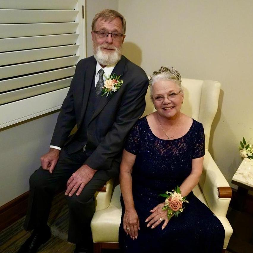 The Grooms parents - Kathy Erickson and Larry Mitchell