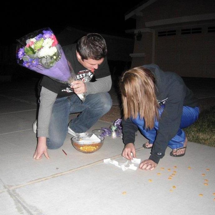I only knew of Nate from track & field before this. Nate created a goldfish walkway & stood at the end of it with balloons, flowers & a puzzle that stated "Of All The Fish In The Sea, Prom with Me?".