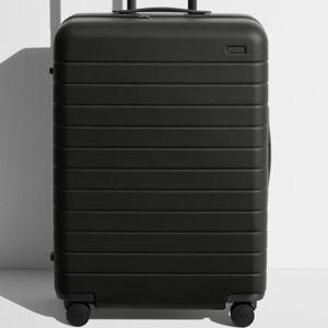 The Medium Suitcases in Jet Black | Away