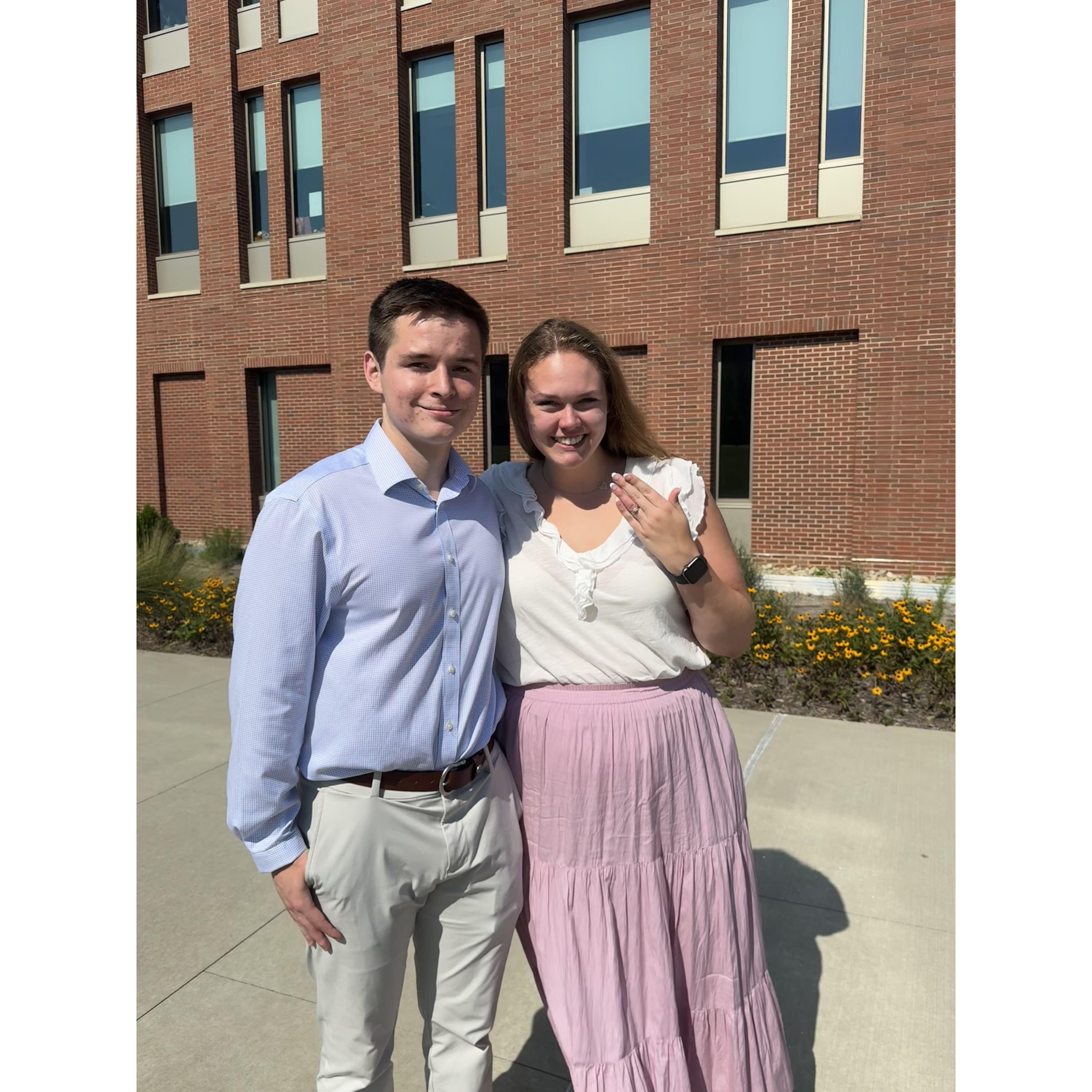 Right after we got engaged, outside of the building we met in!