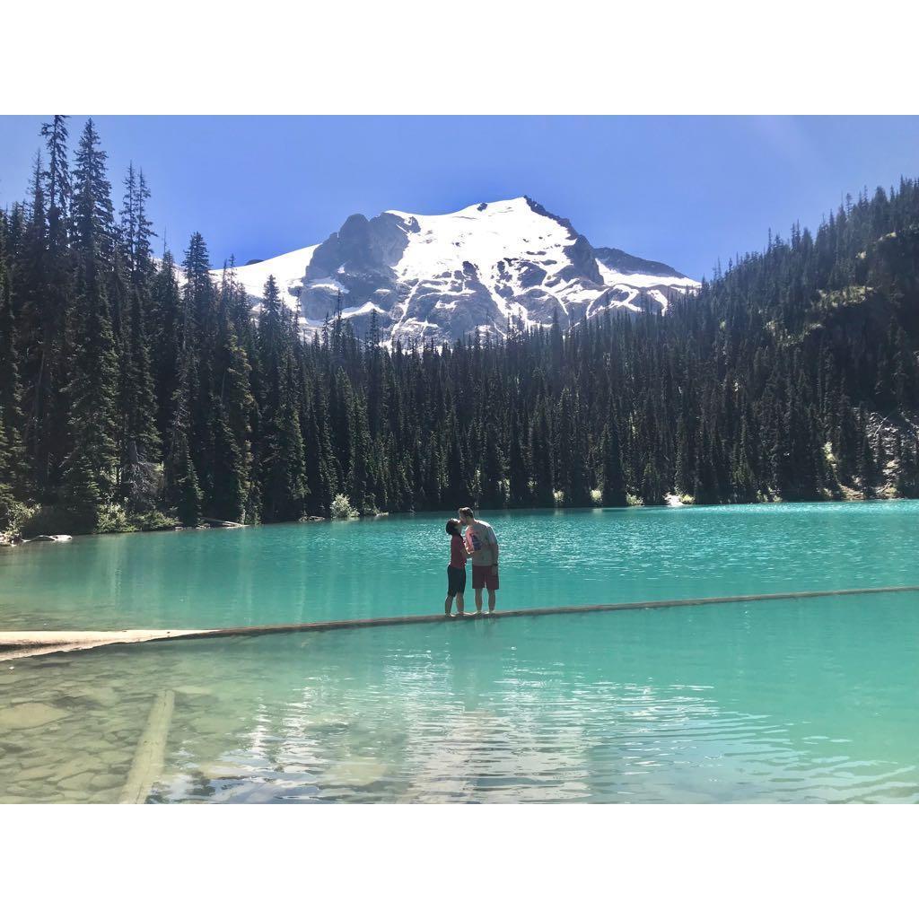 The day after Frank proposed atop a hike he and Maretie went on another hike and struck this high-risk pose