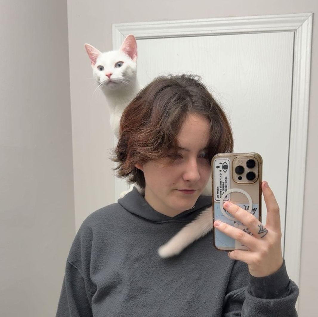 Our baby cat and Chelsie, Evie Iris