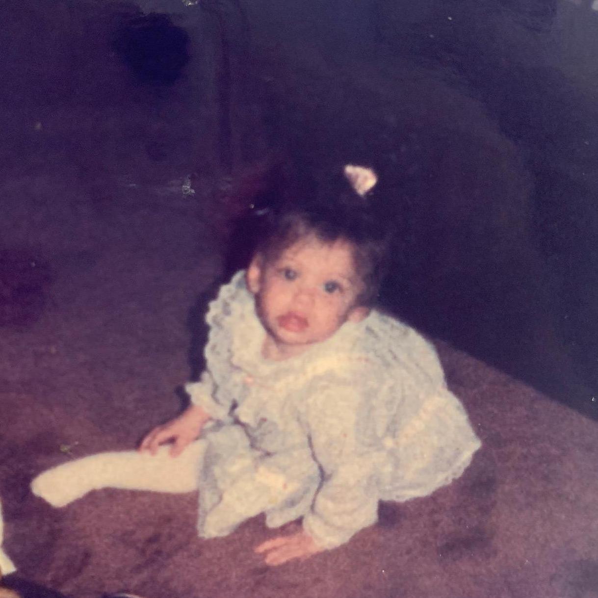 Angela always wanted to wear a "pretty dress"