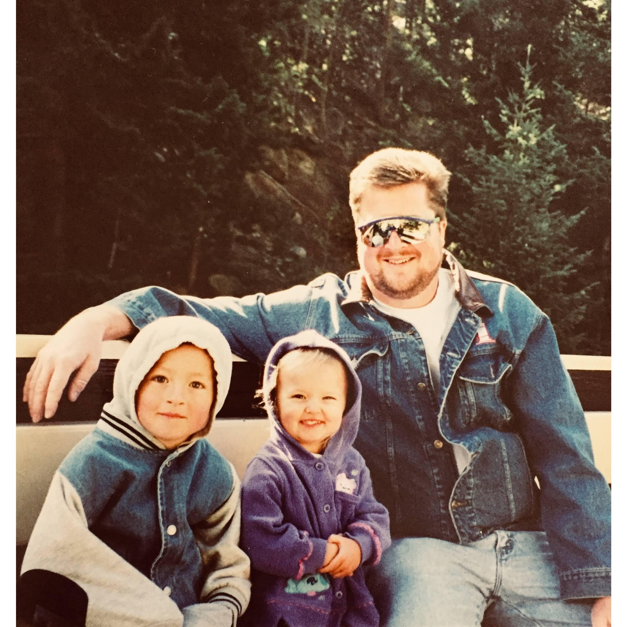 Mallorys brother (Jacob), Mallory, and their dad (Darrell) cira early 2000's.