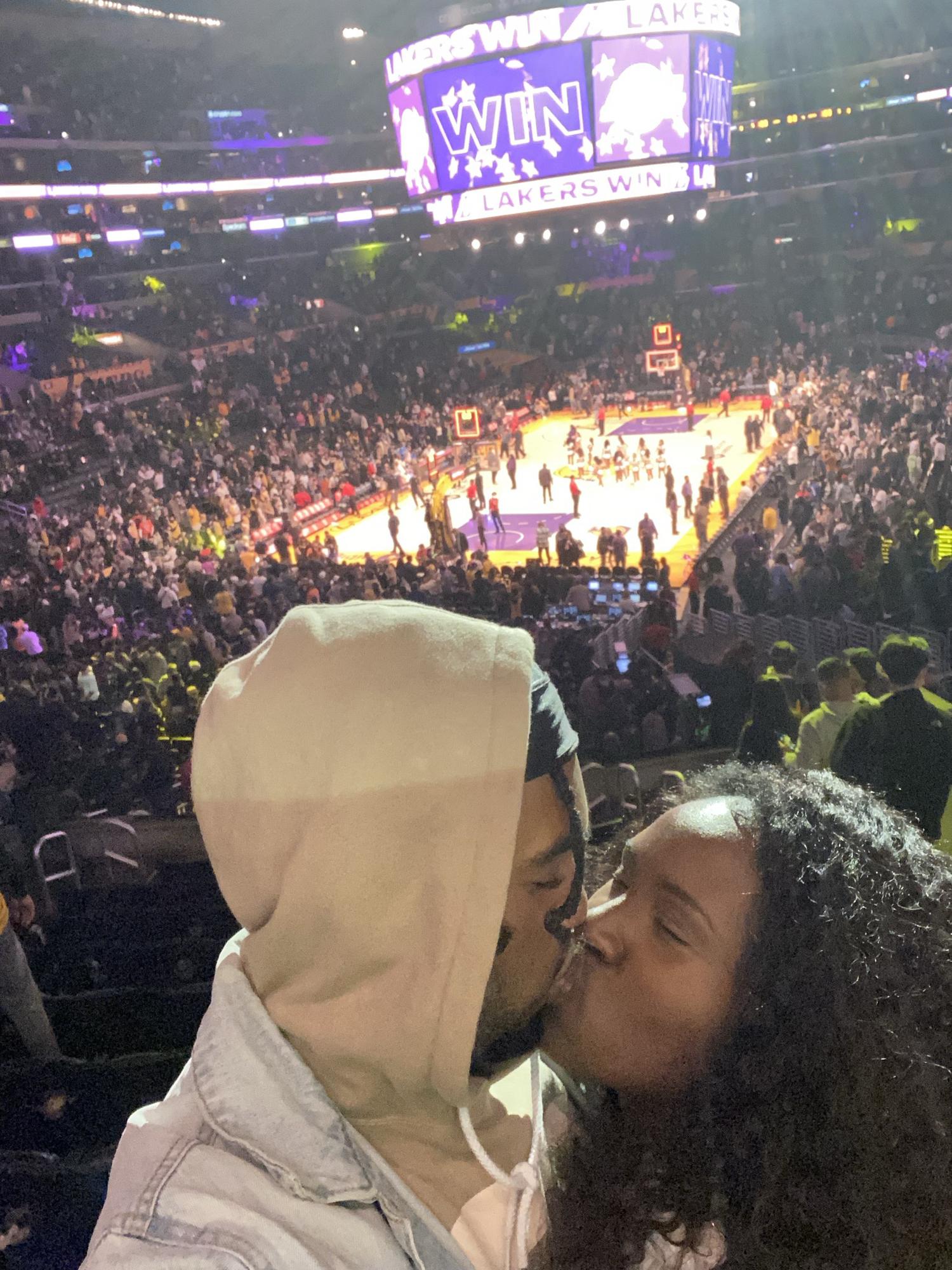 Nia takes Lami to his first basketball game!