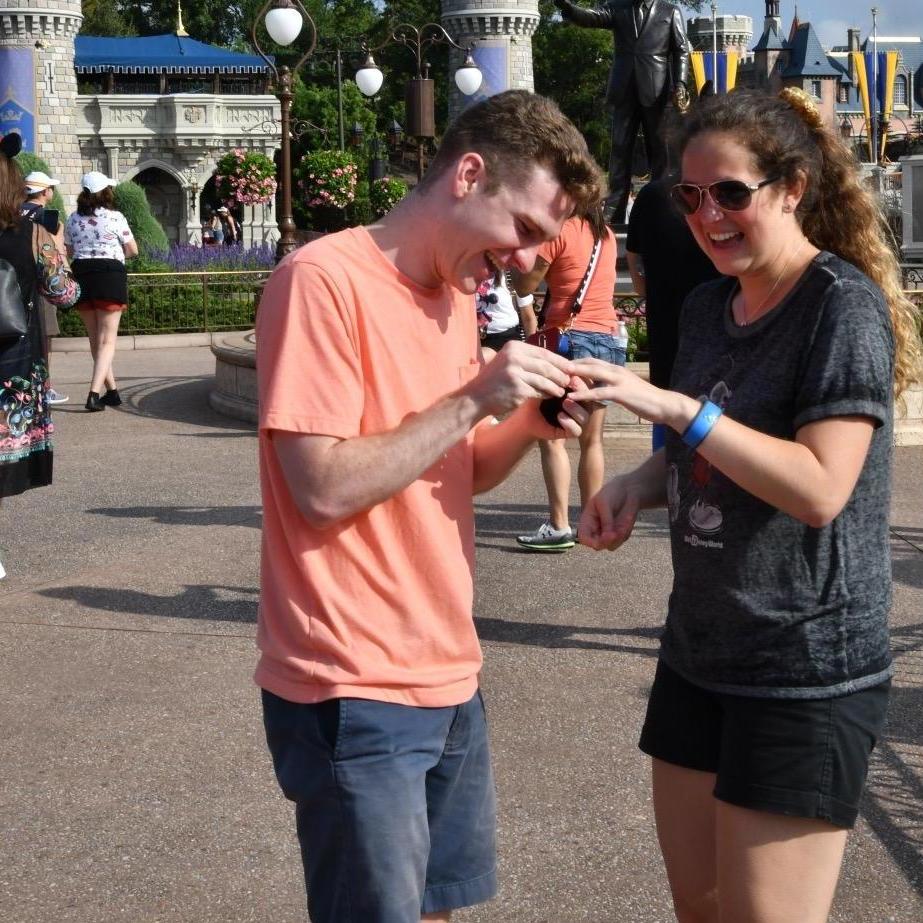 Emily was shaking so much with excitement that she needed help with the ring.