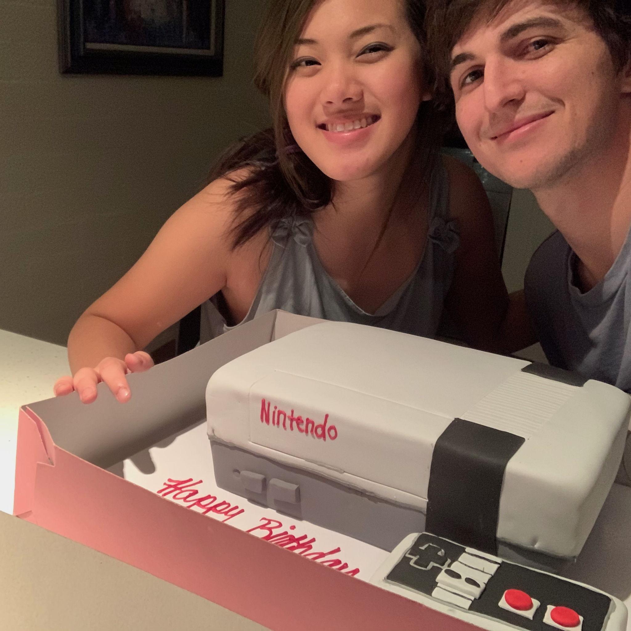 Patrick went gold standard on the cake for Susan's 26th birthday