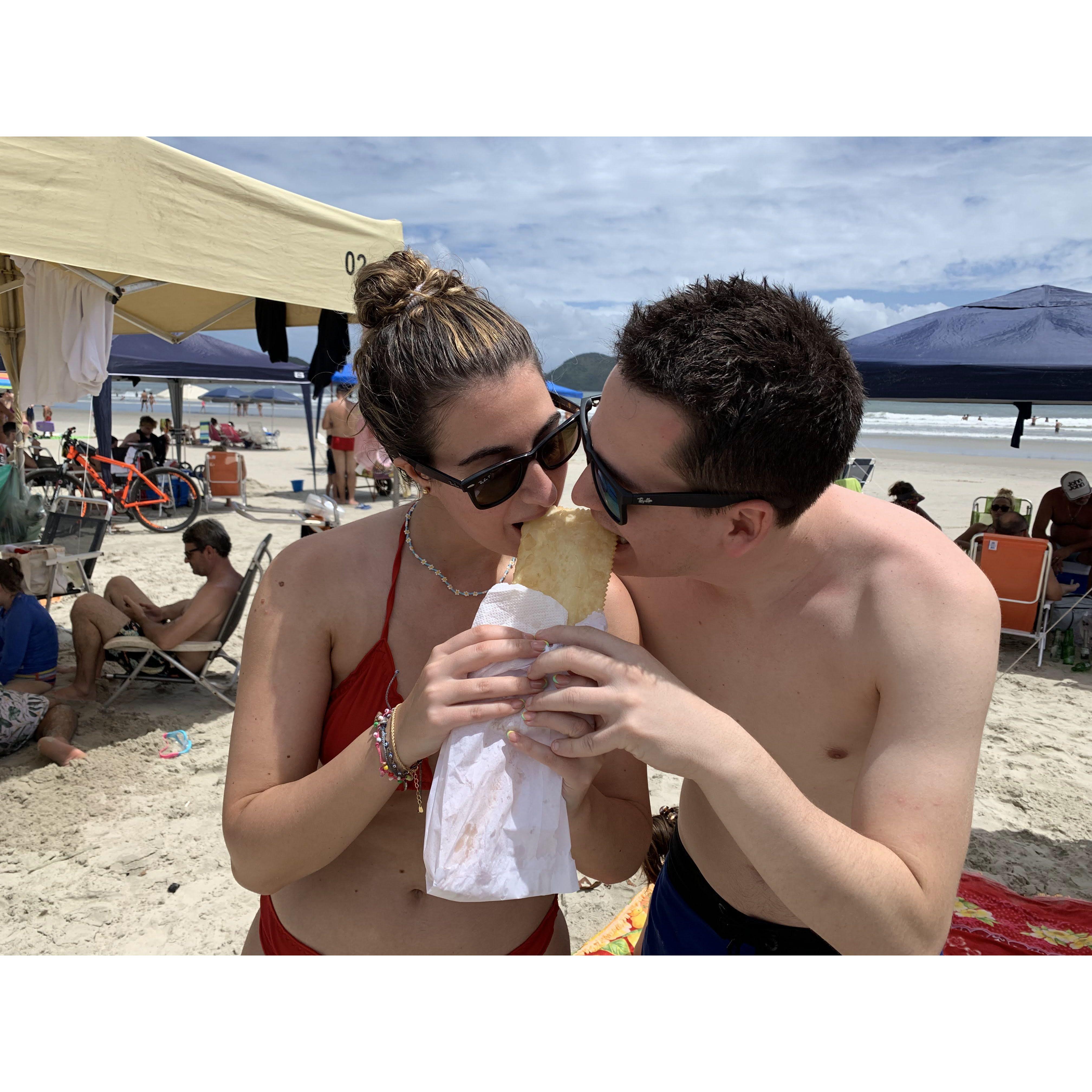 December 2021 - Eating a "pastel de carne" in Brazil - one of Daniela's favorite Brazilian foods!