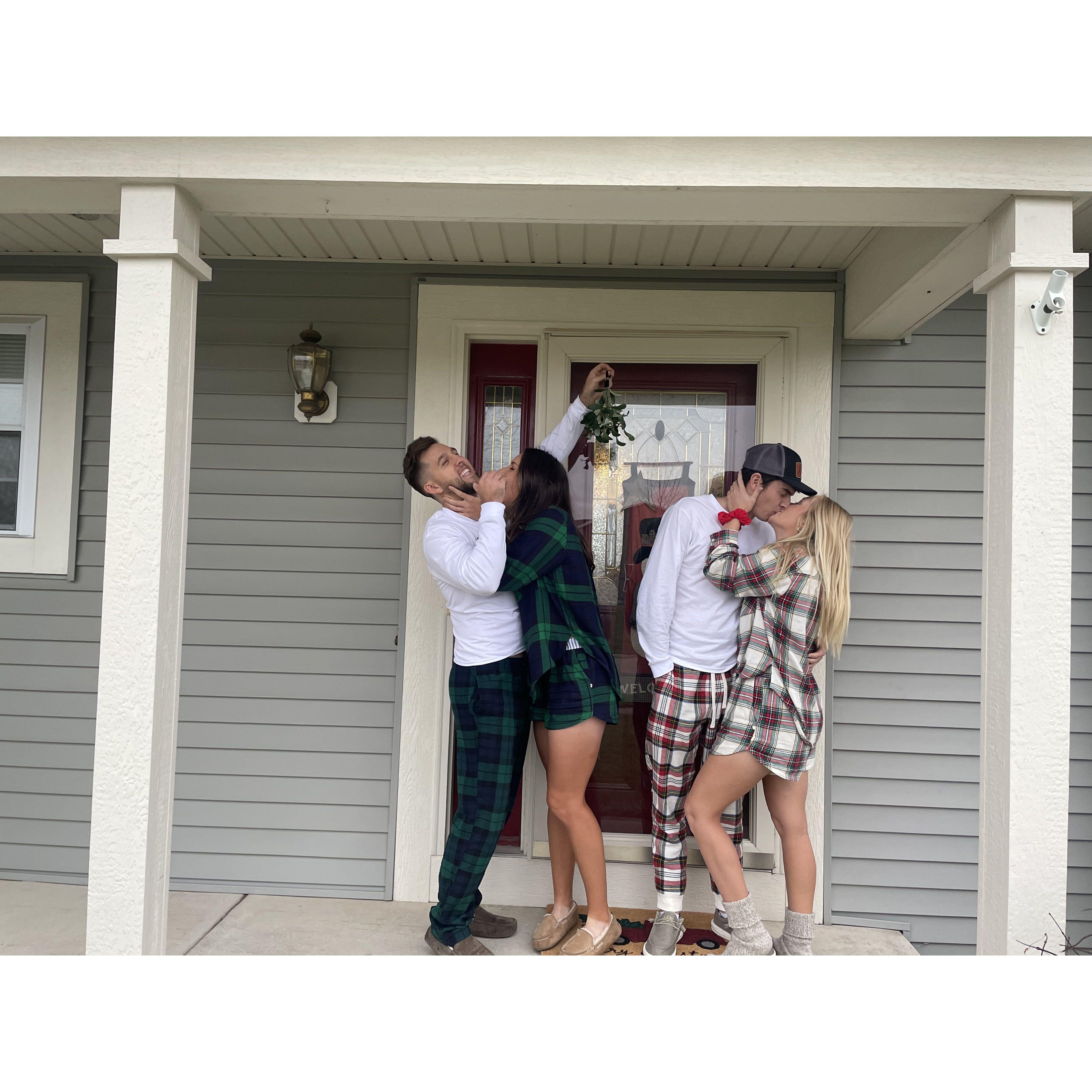 "Kisses" under the mistletoe.