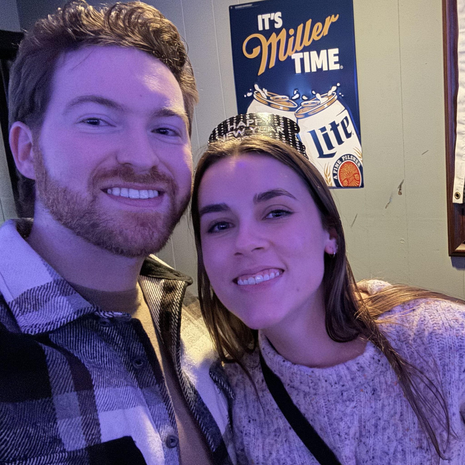 This was taken on New Year's Eve 2025, making. it our last New Year photo not married!