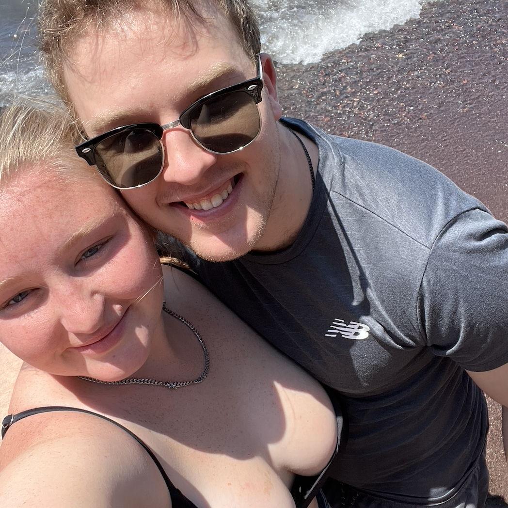Swimming in Greece at the black sand beach