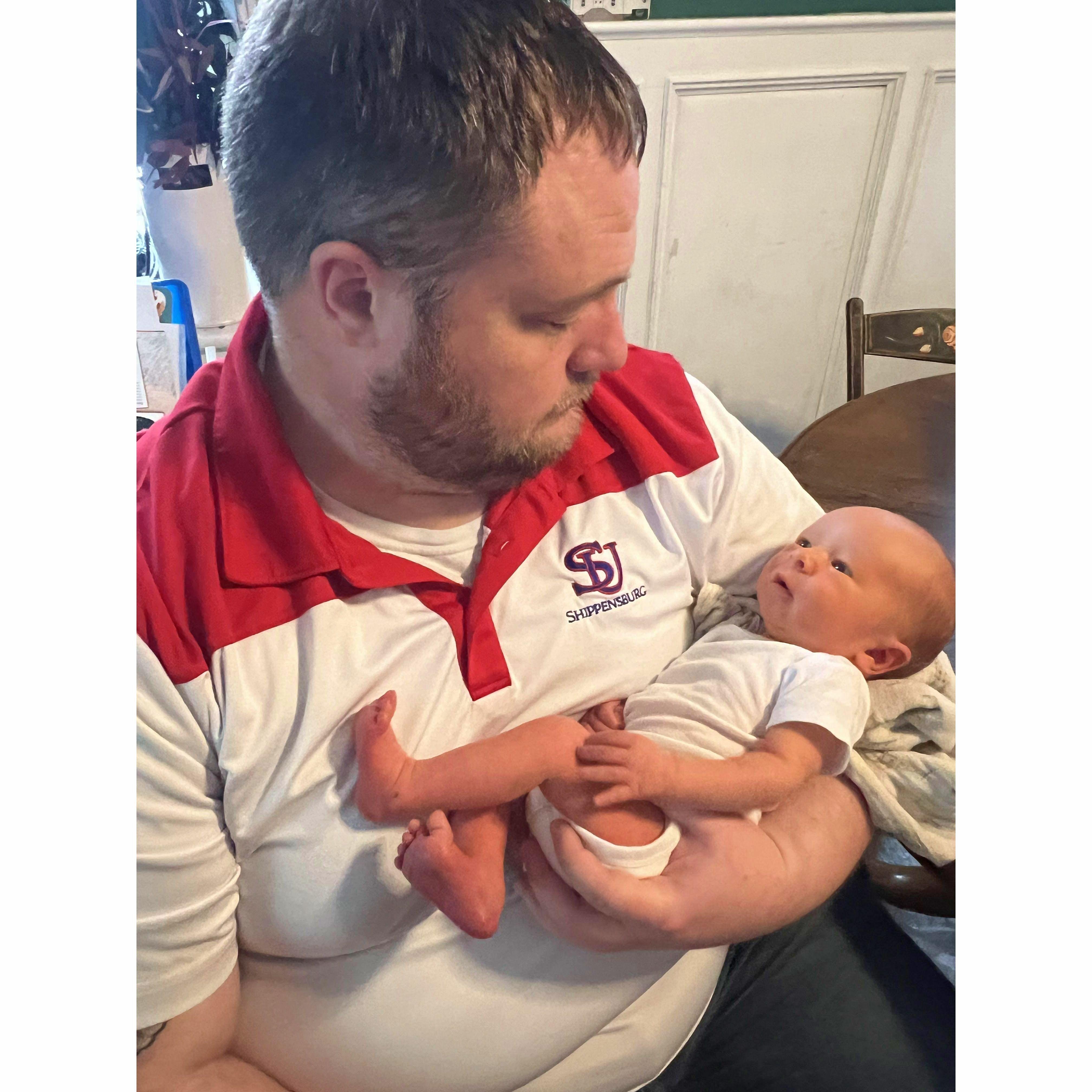 Rob holding the newest addition to the Clelan family, Joshua