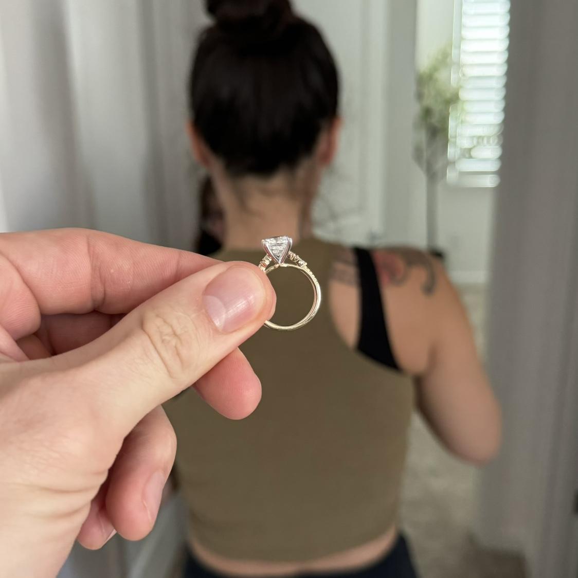 Aaron hid the ring from Tiana for months. Taking photos of it during their  special moments.