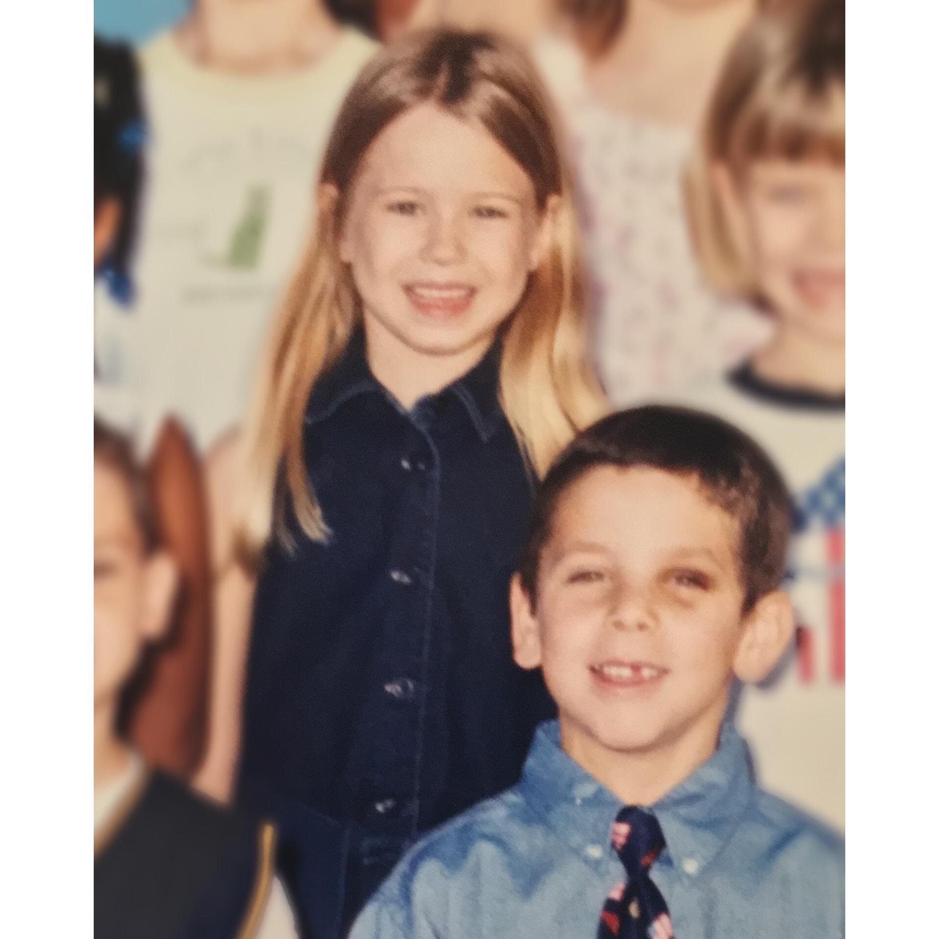 Our first photo together on record, circa 2002. Featuring Alex's black eye and Hannah's cute smile.