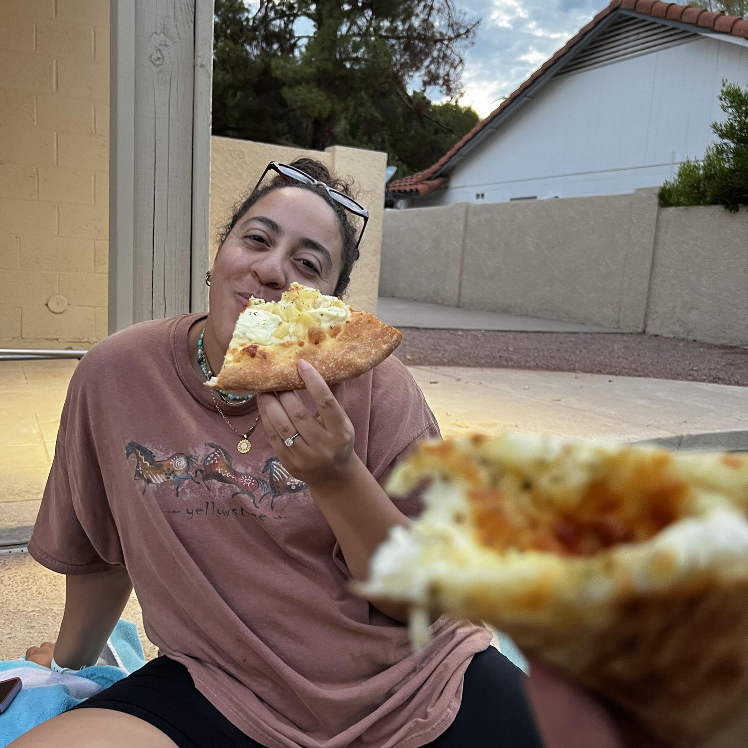 The day we got the keys to our house, enjoying pizza by the pool :)