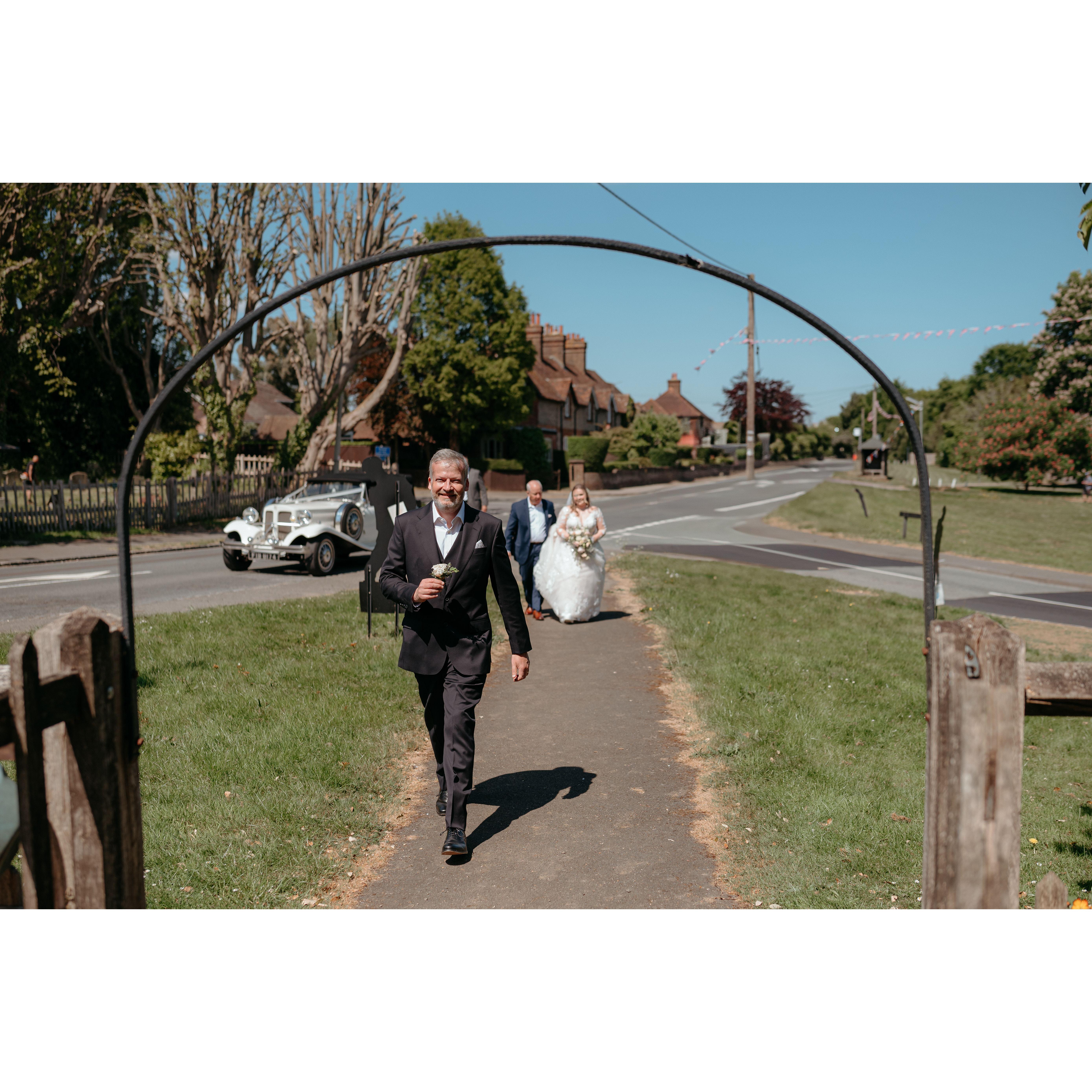 Stuart running Tom’s buttonhole to him