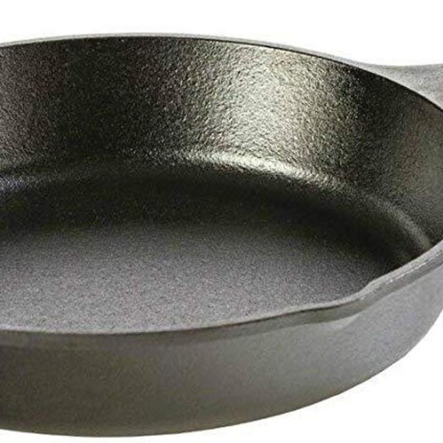 Lodge Seasoned Cast Iron Skillet with Hot Handle Holder- 10.25 Inch Cast Iron Frying Pan with Genuine Spiral Stitching Nokona Leather Hot Handle Holder, Made to Last a Lifetime