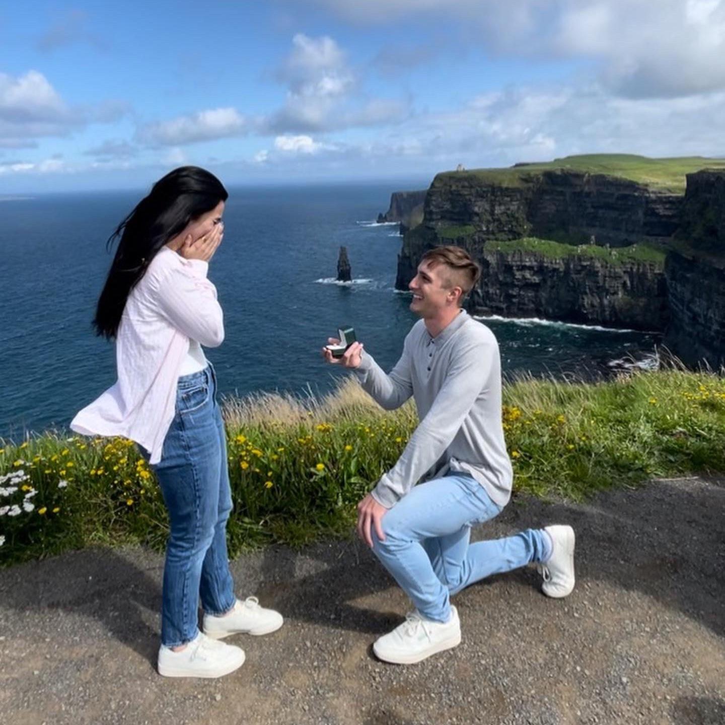 The most magical moment when Michael proposed while we were at the Cliffs of Moher in Ireland