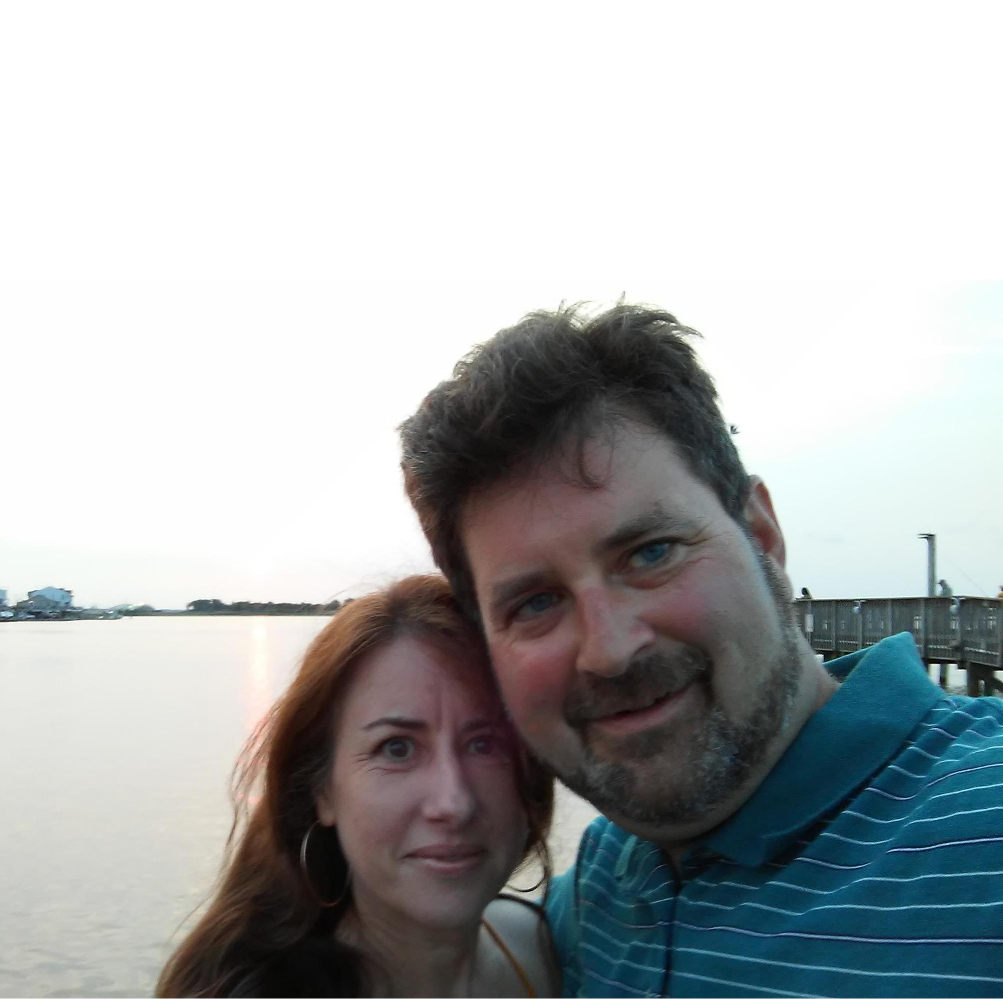 Having a stroll by the water at sunset!