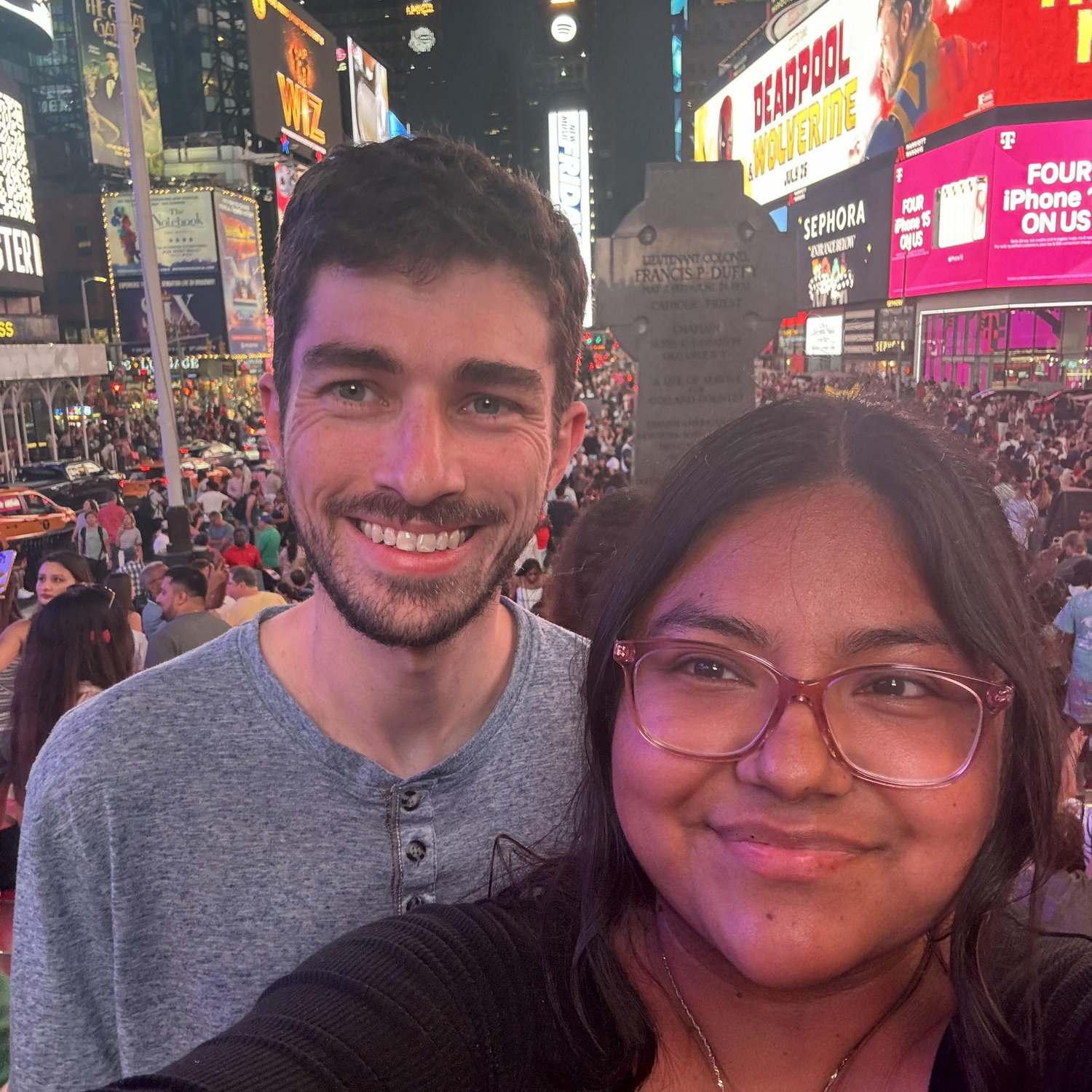 Our first trip to New York calls for a photo opportunity at the red stairs in Times Square